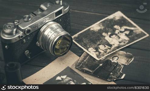 October 23, 2017, Kiev, Ukraine. Still life with retro soviet photo camera FED-2 and lens Industar over wooden desk