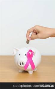 October Breast Cancer Awareness month, Pink Ribbon with Piggy Bank for support illness life. Health, Donation, Charity, C&aign, Money Saving, Fund, women day and World cancer day concept