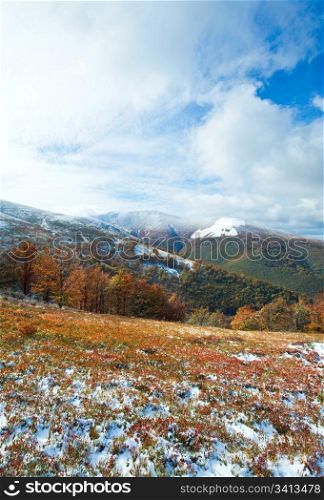 October Carpathian mountain Borghava plateau with first winter snow and autumn colorful foliage
