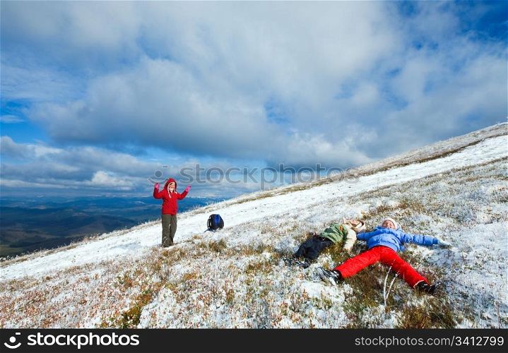 October Carpathian mountain Borghava plateau with first winter snow (and mother with children)