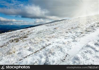 October Carpathian mountain Borghava plateau with first winter snow and sunshine in sky