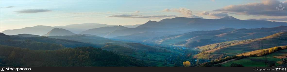 October evening Carpathian mountain country panorama. Four shots composite picture.