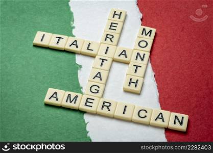 October - National Italian American Heritage Month, crossword against paper abstract in colors of national flag of Italy (green, white and red), reminder of cultural event