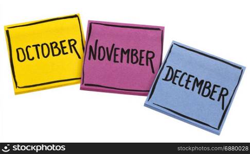 October, November and December - handwriting in black ink on isolated sticky notes