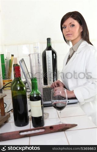 Oenologist analysing a wine