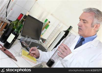 Oenologist testing a wine