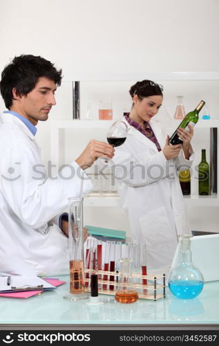 oenologists working in a lab