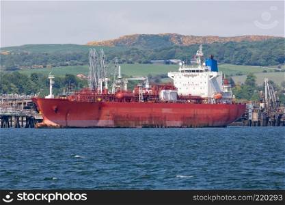 Off shore terminal for North Sea oil with tank ship in Firth of Forth near Scottish Edinburgh. Oil terminal with tanker in Firth of Forth near Edinburgh