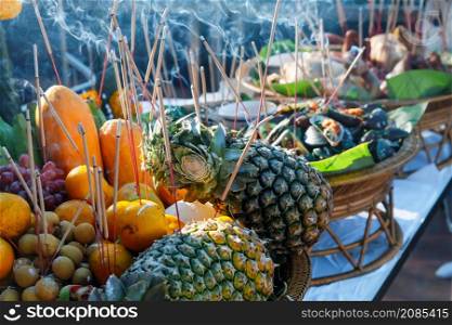 Offer sacrifices to one's anxestors, Close up Image of Sacrificial offering food for pray to god and memorial to ancestor, Traditional offerings to gods with food, vegetable and fruits