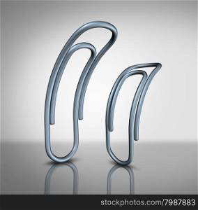 Office bullying and bullies in the workplace concept as two paperclips with one intimidating another as a corporate bully metaphor and worker management.
