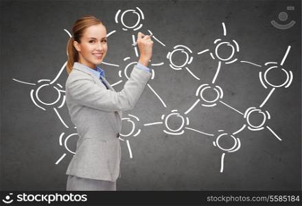 office, business, education, science and new technology concept - smiling businesswoman writing something in the air with marker