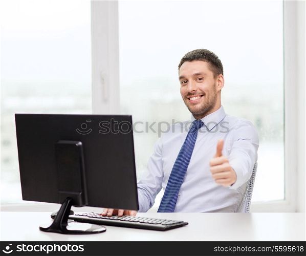 office, business, education, technology and internet concept - smiling businessman or student with computer showing thumbs up gesture