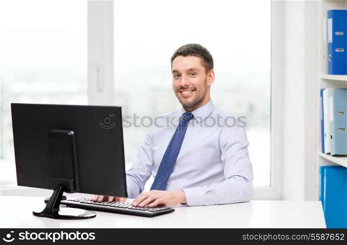 office, business, education, technology and internet concept - smiling businessman or student with computer