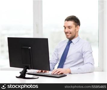 office, business, education, technology and internet concept - smiling businessman or student with computer