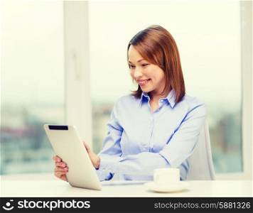office, business, education, technology and internet concept - smiling businesswoman or student with tablet pc and coffee