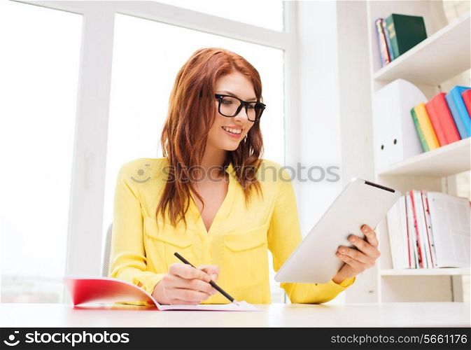 office, business, education, technology and internet concept - smiling businesswoman or student with tablet pc