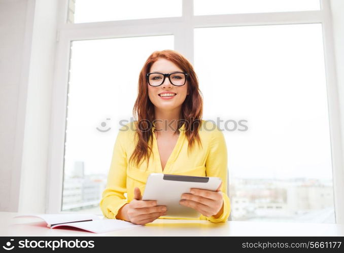 office, business, education, technology and internet concept - smiling businesswoman or student with tablet pc