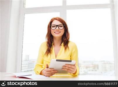 office, business, education, technology and internet concept - smiling businesswoman or student with tablet pc