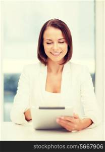 office, business, technology and internet concept - businesswoman with tablet pc in office