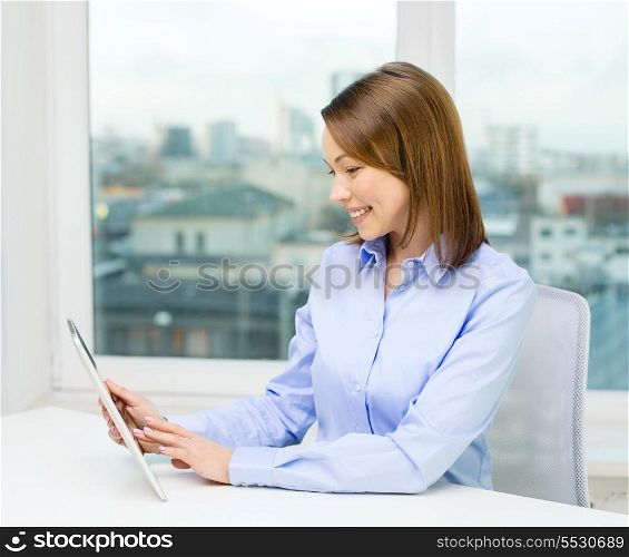 office, business, technology and internet concept - smiling businesswoman with tablet pc