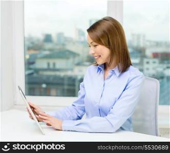 office, business, technology and internet concept - smiling businesswoman with tablet pc
