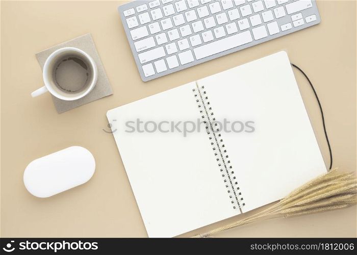 Office desk table top view with office supply, Beige table with copy space, Beige color workplace composition, flat lay