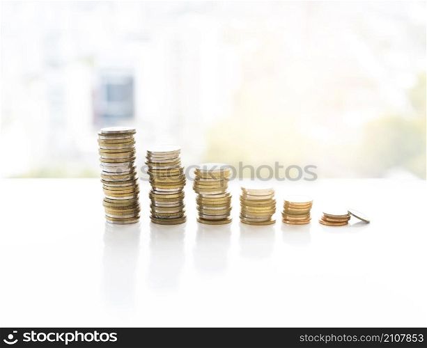 office desktop with stacked coins