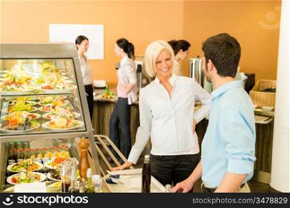 Office people at cafeteria chatting hold serving tray canteen self-service