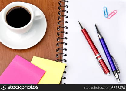 office supplies and coffee cup isolated on white background