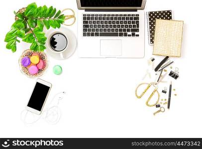 Office supplies and laptop. Creative business still life. Coffee and macaroon cookies. Flat lay