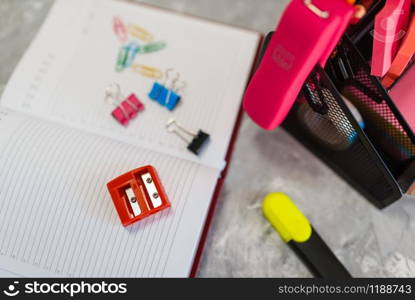 Office supplies, pencil sharpener on the table in stationery store, nobody. assortment in shop, accessories for drawing and writing, school equipment