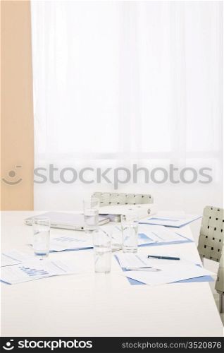 Office supply on table after successful sales business meeting