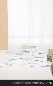 Office supply on table after successful sales business meeting