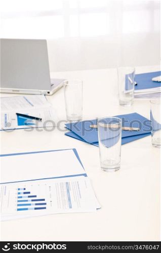 Office supply on table before successful sales business meeting