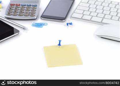 Office table with notebook, computer keyboard and mouse, tablet pc and smartphone. Copy space for text