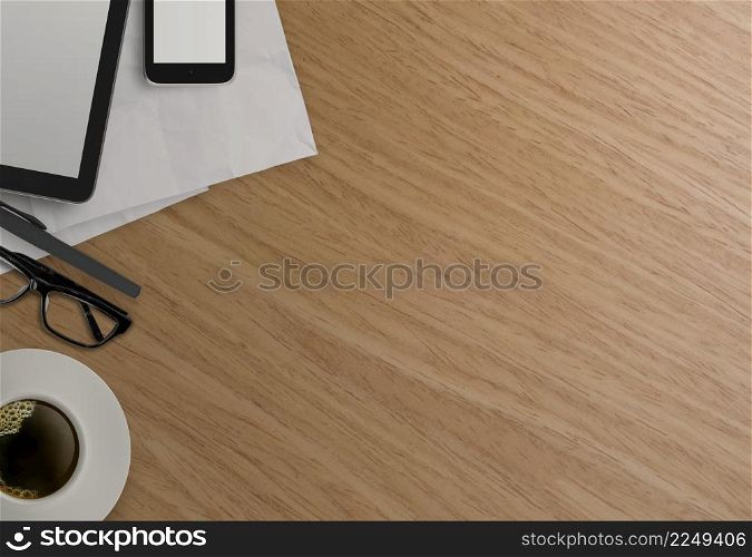Office table with tablet computer,mobile phone and coffee cup on wooden background
