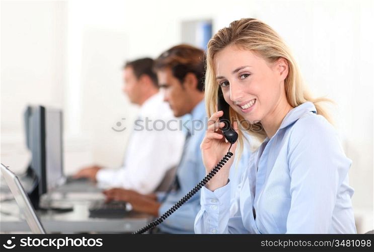 Office worker answering the phone