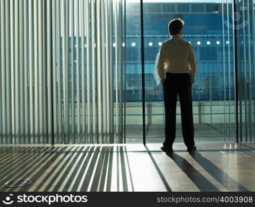 Office worker looking out of the window