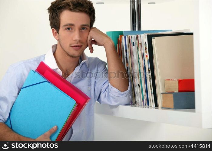 Office worker posing with his files