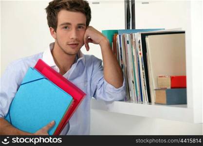 Office worker posing with his files