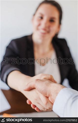 office worker shaking hands