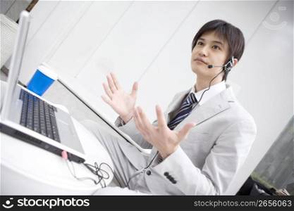 Office worker talking with headset