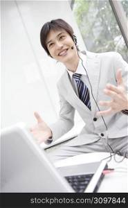 Office worker talking with headset