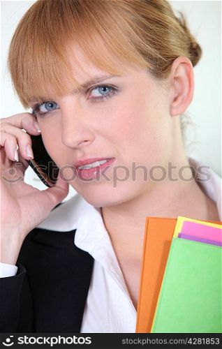 Office worker using a mobile phone