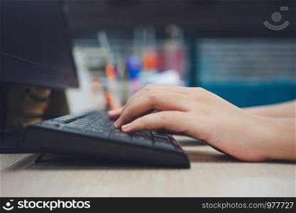 Office worker Using a portable computer on a desk concept works. Staff salaries using as background business concept with copy space and white space.