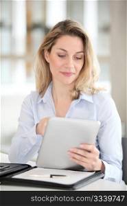 Office worker using electronic tab