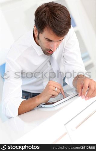 Office worker using electronic tablet