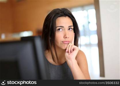 Office worker with interrogative look on her face