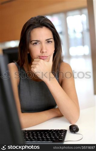 Office worker with upset look on her face