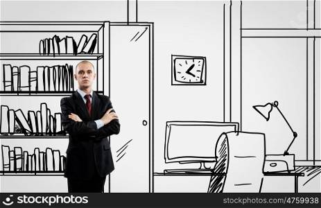 Office worker. Young confident businessman standing in drawn office